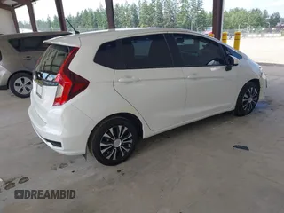 2019 Honda Fit LX with VIN 3HGGK5H47KM728638, listed as a IAAI auction lot 42440916 with 65,953 mi miles and . Bid and sale history available at DreamBid. Image 4.
