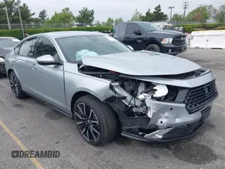 2024 Honda Accord Touring with VIN 1HGCY2F87RA082705, listed as a IAAI auction lot 42194619 with 7,896 mi miles and . Bid and sale history available at DreamBid. Image 1.
