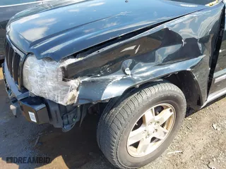 2007 Jeep Grand Cherokee Laredo with VIN 1J8GR48K57C519919, listed as a IAAI auction lot 42016344 with 190,132 mi miles. Bid and sale history available at carsss.com. Image 6.