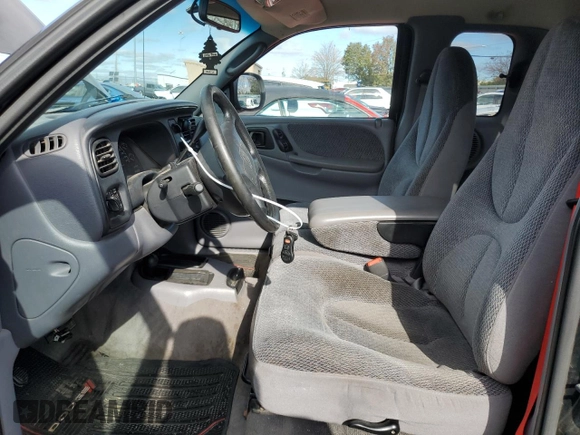 1999 Dodge Dakota SLT with VIN 1B7GG22Y5XS107729, listed as a Copart auction lot 79440034 with 163,718 mi miles and Salvage Title. Bid and sale history available at DreamBid. Image 7.