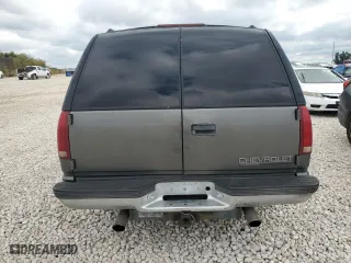 1999 Chevrolet Tahoe with VIN 1GNEC13R6XR150124, listed as a Copart auction lot 70630524 with 238,990 mi miles and Salvage Title. Bid and sale history available at carsss.com. Image 6.