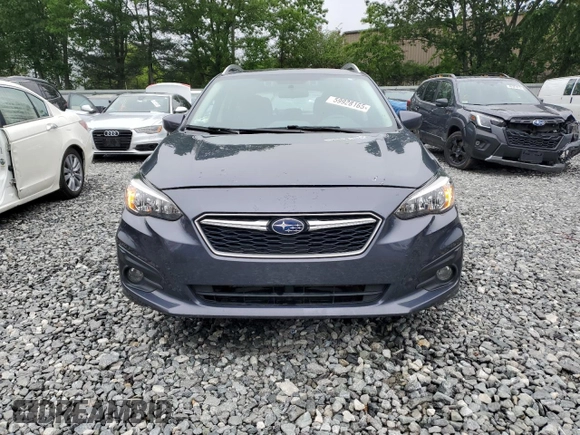 2017 Subaru Impreza Premium z VIN 4S3GTAD6XH3703075, wystawiony jako Copart lot #59928165 z przebiegiem 95 866 mil mil oraz Szkoda całkowita • Salvage title. Historia ofert i sprzedaży dostępna na DreamBid. Obrazek 5.