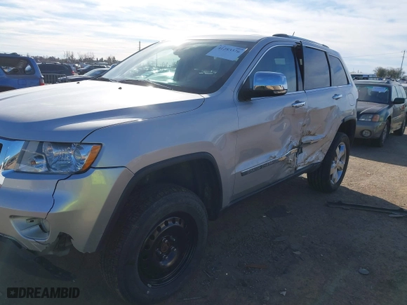 2012 Jeep Grand Cherokee Overland with VIN 1C4RJFCTXCC201422, listed as a IAAI auction lot 41283376 with 93,736 mi miles. Bid and sale history available at carsss.com. Image 6.