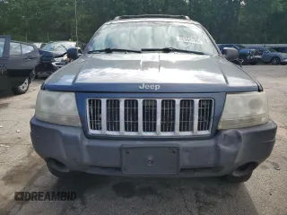 2004 Jeep Grand Cherokee Laredo with VIN 1J4GX48S24C216941, listed as a Copart auction lot 55584785 with 279,710 mi miles and Salvage title. Bid and sale history available at DreamBid. Image 5.