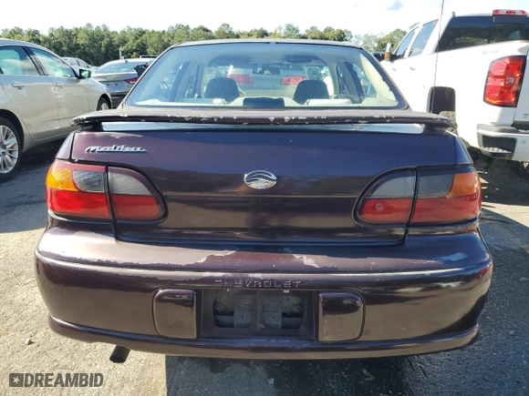 1999 Chevrolet Malibu with VIN 1G1ND52TXX6207994, listed as a Copart auction lot 81158764 with 69,332 mi miles and Salvage Title. Bid and sale history available at carsss.com. Image 6.