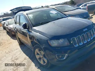 2015 Jeep Compass Latitude with VIN 1C4NJDEB1FD218499, listed as a IAAI auction lot 41653174 with 122,461 mi miles. Bid and sale history available at carsss.com. Image 1.