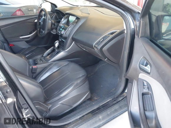 2013 Ford Focus Titanium with VIN 1FADP3J20DL143491, listed as a IAAI auction lot 42034388 with 194,388 mi miles and . Bid and sale history available at carsss.com. Image 5.