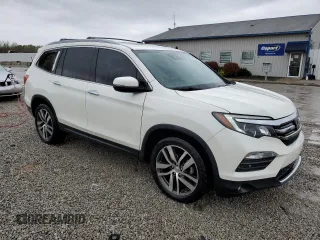2017 Honda Pilot Elite with VIN 5FNYF6H04HB056917, listed as a Copart auction lot 51770735 with 88,762 mi miles and Salvage Title. Bid and sale history available at DreamBid. Image 4.