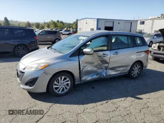 2012 Mazda 5 Sport with VIN JM1CW2BL4C0107068, listed as a Copart auction lot 62880615 with 142,610 mi miles and Salvage title. Bid and sale history available at DreamBid. Image 1.