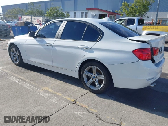 2015 BMW 3 Series 328i with VIN WBA3C1C52FK119339, listed as a IAAI auction lot 41549876 with 148,347 mi miles and . Bid and sale history available at carsss.com. Image 3.