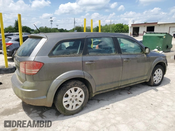 2013 Dodge Journey SE z VIN 3C4PDCAB0DT728950, wystawiony jako Copart lot #57525305 z przebiegiem 181 414 mil mil oraz Czysty tytuł • Clean title. Historia ofert i sprzedaży dostępna na DreamBid. Obrazek 3.