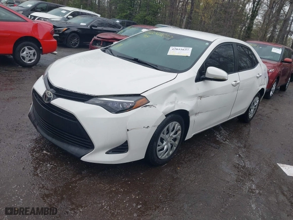 2019 Toyota Corolla L with VIN 5YFBURHE6KP937090, listed as a IAAI auction lot 42041637 with 129,138 mi miles. Bid and sale history available at carsss.com. Image 17.