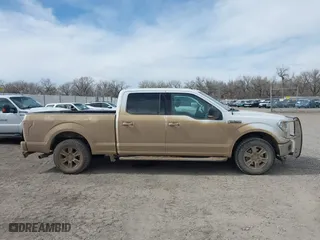 2015 Ford F-150 XLT w/HD Payload Pkg with VIN 1FTFW1EF3FFB70225, listed as a IAAI auction lot 41890185 with 169,564 mi miles. Bid and sale history available at carsss.com. Image 13.