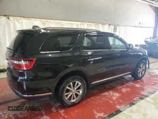 2014 Dodge Durango Limited z VIN 1C4RDJDG7EC593631, wystawiony jako Copart lot #57390155 z przebiegiem 100 657 mil mil oraz Szkoda całkowita • Salvage title. Historia ofert i sprzedaży dostępna na DreamBid. Obrazek 3.