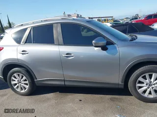 2013 Mazda CX-5 Touring with VIN JM3KE2CE3D0123138, listed as a IAAI auction lot 41818678 with 173,909 mi miles. Bid and sale history available at carsss.com. Image 13.