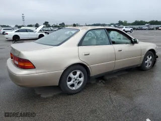1998 Lexus ES 300 Luxury Sport Sdn with VIN JT8BF28G3W0128650, listed as a Copart auction lot 65796984 with 221,745 mi miles and Salvage Title. Bid and sale history available at carsss.com. Image 3.