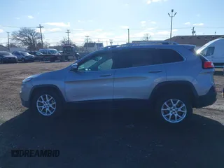 2014 Jeep Cherokee Latitude with VIN 1C4PJMCBXEW107559, listed as a IAAI auction lot 41859246 with 94,812 mi miles and . Bid and sale history available at DreamBid. Image 14.