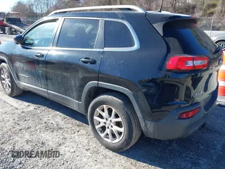 2018 Jeep Cherokee Latitude with VIN 1C4PJMCB1JD589473, listed as a IAAI auction lot 41665630 with 106,371 mi miles and . Bid and sale history available at DreamBid. Image 3.