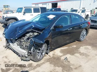 2016 Nissan Altima SR z VIN 1N4AL3AP8GC292164, wystawiony jako IAAI lot #42053545 z przebiegiem 99 743 mil mil oraz . Historia ofert i sprzedaży dostępna na DreamBid. Obrazek 19.