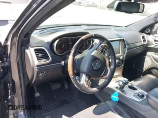 2014 Jeep Grand Cherokee Summit with VIN 1C4RJFJG8EC434899, listed as a IAAI auction lot 42399912 with 186,840 mi miles and . Bid and sale history available at DreamBid. Image 20.