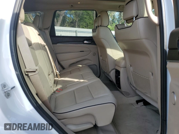 2019 Jeep Grand Cherokee Overland with VIN 1C4RJFCT2KC834690, listed as a Copart auction lot 84303144 with 63,053 mi miles and Salvage Title. Bid and sale history available at carsss.com. Image 11.