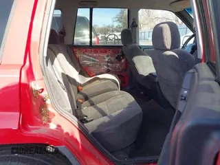 1996 Jeep Grand Cherokee Laredo with VIN 1J4GZ58Y8TC374929, listed as a IAAI auction lot 41725111 with 196,723 mi miles. Bid and sale history available at carsss.com. Image 8.