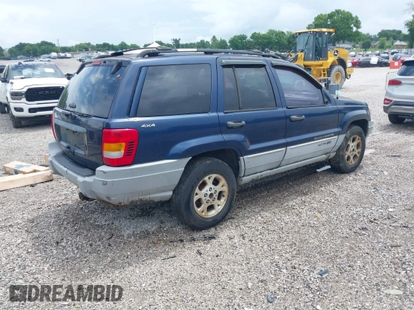 2000 Jeep Grand Cherokee Laredo z VIN 1J4GW48S9YC338947, wystawiony jako IAAI lot #42545830 z przebiegiem 234 251 mil mil oraz . Historia ofert i sprzedaży dostępna na DreamBid. Obrazek 4.