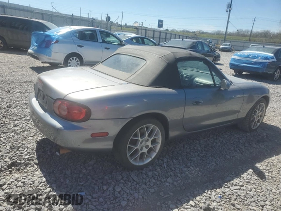 2002 Mazda MX-5 Miata Cloth with VIN JM1NB353120225910, listed as a Copart auction lot 49684455 with Not provided miles and Salvage title. Bid and sale history available at DreamBid. Image 3.