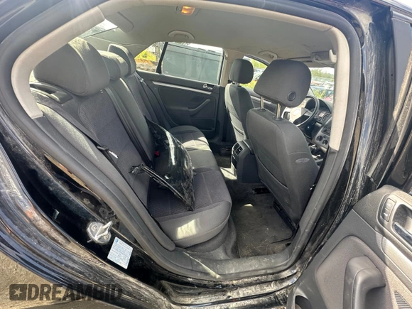 2006 Volkswagen Jetta z VIN 3VWRF31K56M604489, wystawiony jako Copart lot #61240034 z przebiegiem 136 199 mil mil oraz Szkoda całkowita • Salvage title. Historia ofert i sprzedaży dostępna na DreamBid. Obrazek 10.