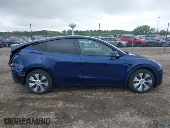 2023 Tesla Model Y Long Range z VIN 7SAYGDEE0PF840787, wystawiony jako IAAI lot #42172489 z przebiegiem 16 314 mil mil oraz . Historia ofert i sprzedaży dostępna na DreamBid. Obrazek 14.