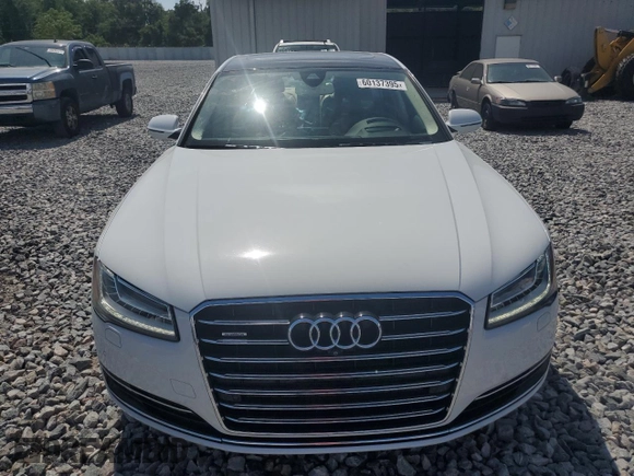2015 Audi A8 3.0T z VIN WAU3GAFD9FN033886, wystawiony jako Copart lot #60137395 z przebiegiem 48 281 mil mil oraz Szkoda całkowita • Salvage title. Historia ofert i sprzedaży dostępna na DreamBid. Obrazek 5.