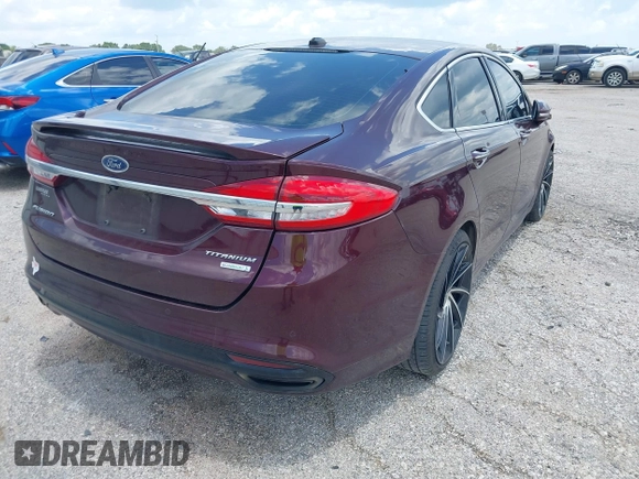2018 Ford Fusion Titanium with VIN 3FA6P0K92JR114283, listed as a IAAI auction lot 42704476 with 92,502 mi miles and . Bid and sale history available at DreamBid. Image 4.