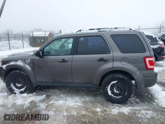 2012 Ford Escape XLS z VIN 1FMCU9C72CKA10130, wystawiony jako IAAI lot #41543233 z przebiegiem 168 552 mil mil oraz . Historia ofert i sprzedaży dostępna na DreamBid. Obrazek 14.