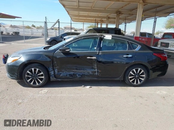 2018 Nissan Altima SR with VIN 1N4AL3AP9JC281858, listed as a IAAI auction lot 41430089 with 117,279 mi miles and . Bid and sale history available at DreamBid. Image 14.