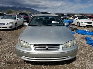2001 Toyota Camry CE z VIN 4T1BG22K21U058793, wystawiony jako Copart lot #57351245 z przebiegiem 186 095 mil mil oraz Szkoda całkowita • Salvage title. Historia ofert i sprzedaży dostępna na DreamBid. Obrazek 5.