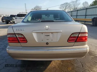 2002 Mercedes-Benz E-Class with VIN WDBJF65J22B490275, listed as a Copart auction lot 51128565 with 142,232 mi miles and Salvage Title. Bid and sale history available at carsss.com. Image 6.