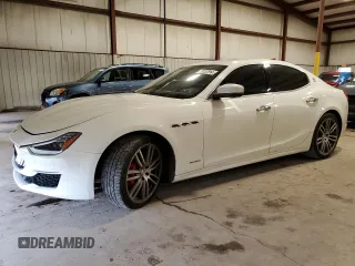 2019 Maserati Ghibli S Q4 GranLusso with VIN ZAM57YTL2K1312724, listed as a Copart auction lot 55137814 with 44,663 mi miles and Salvage Title. Bid and sale history available at carsss.com. Image 1.