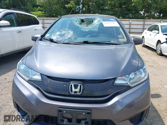2015 Honda Fit LX with VIN 3HGGK5G57FM747786, listed as a IAAI auction lot 42656703 with 102,637 mi miles and . Bid and sale history available at DreamBid. Image 12.