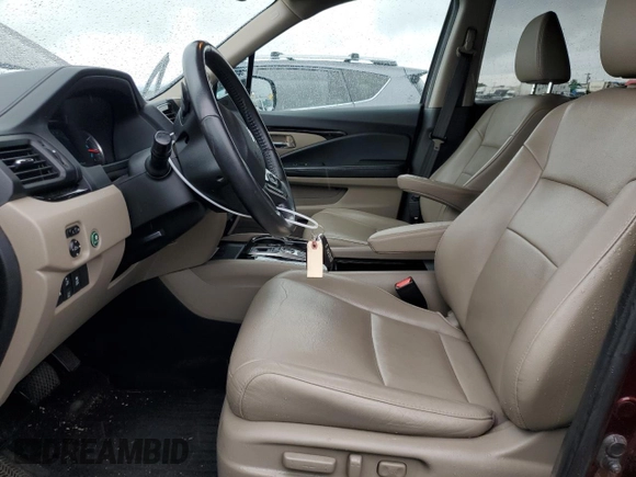 2019 Honda Pilot Touring 8-Passenger with VIN 5FNYF6H94KB056213, listed as a Copart auction lot 56429585 with 106,735 mi miles and Salvage title. Bid and sale history available at DreamBid. Image 7.