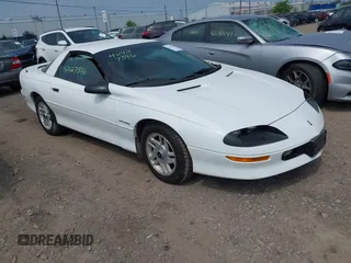 1994 Chevrolet Camaro z VIN 2G1FP22S5R2173095, wystawiony jako IAAI lot #42427396 z przebiegiem 95 713 mil mil oraz . Historia ofert i sprzedaży dostępna na DreamBid. Obrazek 1.