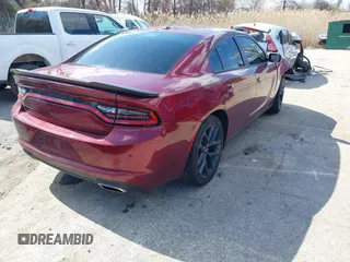 2021 Dodge Charger SXT with VIN 2C3CDXBG2MH616146, listed as a IAAI auction lot 41893157 with 64,676 mi miles. Bid and sale history available at carsss.com. Image 4.