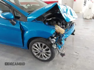 2014 Ford Fiesta SE with VIN 3FADP4EJ7EM204438, listed as a IAAI auction lot 42098291 with 184,930 mi miles and . Bid and sale history available at DreamBid. Image 6.