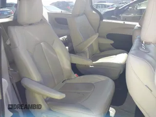 2021 Chrysler Pacifica Hybrid Touring L with VIN 2C4RC1L76MR594571, listed as a IAAI auction lot 40255745 with 58,163 mi miles and . Bid and sale history available at DreamBid. Image 8.