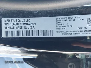 2021 Ram 1500 Big Horn with VIN 1C6SRFBT3MN742627, listed as a IAAI auction lot 41900770 with 52,006 mi miles and . Bid and sale history available at DreamBid. Image 9.