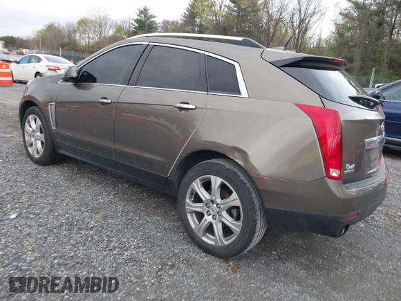 2014 Cadillac SRX Performance Collection with VIN 3GYFNCE33ES570472, listed as a IAAI auction lot 41971511 with 200,811 mi miles. Bid and sale history available at carsss.com. Image 3.