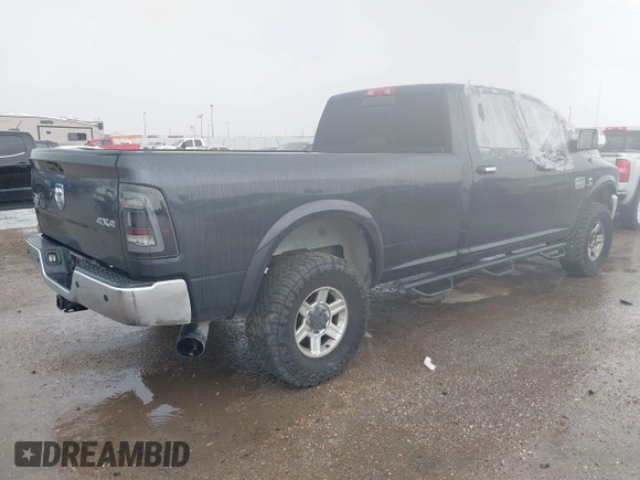 2013 Ram 2500 Laramie Longhorn with VIN 3C6UR5LL6DG570829, listed as a IAAI auction lot 42478766 with 190,743 mi miles and . Bid and sale history available at DreamBid. Image 4.