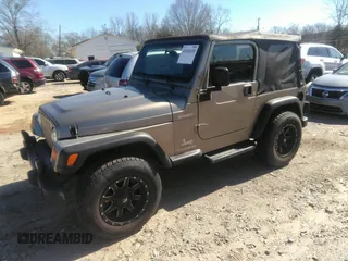 2003 Jeep Wrangler Sport with VIN 1J4FA49S53P365363, listed as a IAAI auction lot 41818320 with 154,567 mi miles. Bid and sale history available at carsss.com. Image 17.