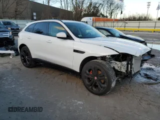 2023 Jaguar F-Pace S with VIN SADCJ2EX0PA711041, listed as a Copart auction lot 87373724 with 9,479 mi miles and Salvage title. Bid and sale history available at DreamBid. Image 4.