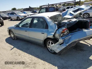 1995 Honda Accord EX w/Leather with VIN 1HGCD5652SA026955, listed as a Copart auction lot 63340254 with 196,374 mi miles and Salvage Title. Bid and sale history available at carsss.com. Image 2.