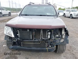 2009 Nissan Frontier SE z VIN 1N6AD09WX9C423595, wystawiony jako IAAI lot #42210046 z przebiegiem 117 142 mil mil oraz . Historia ofert i sprzedaży dostępna na DreamBid. Obrazek 12.